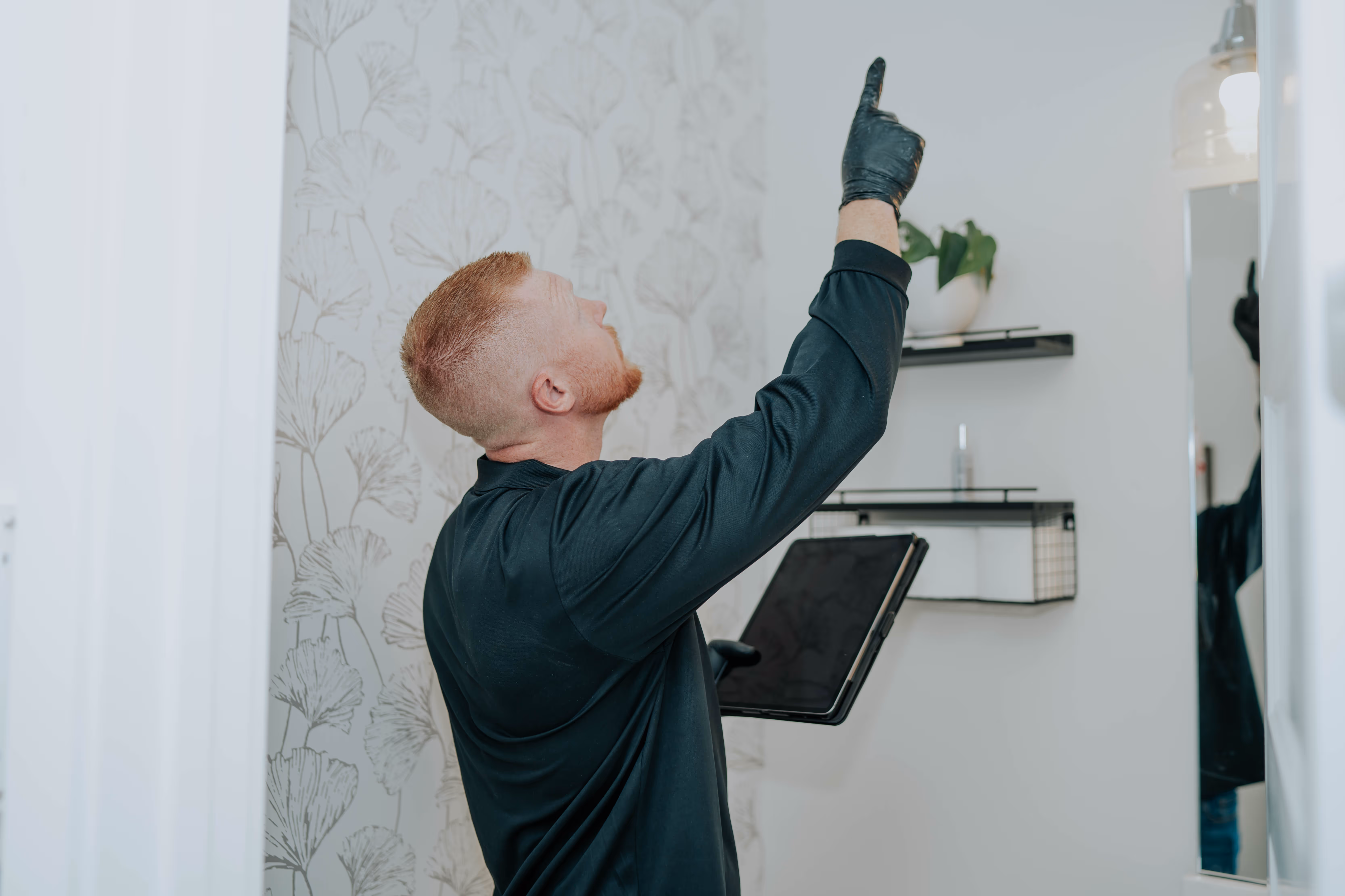 Pure Maintenance of Central Illinois technician conducting a full property mold inspection